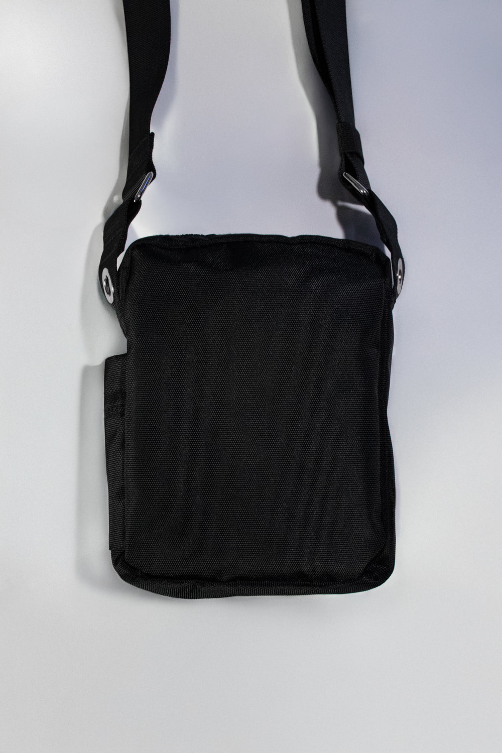 TI CROSS-BODY BAG.