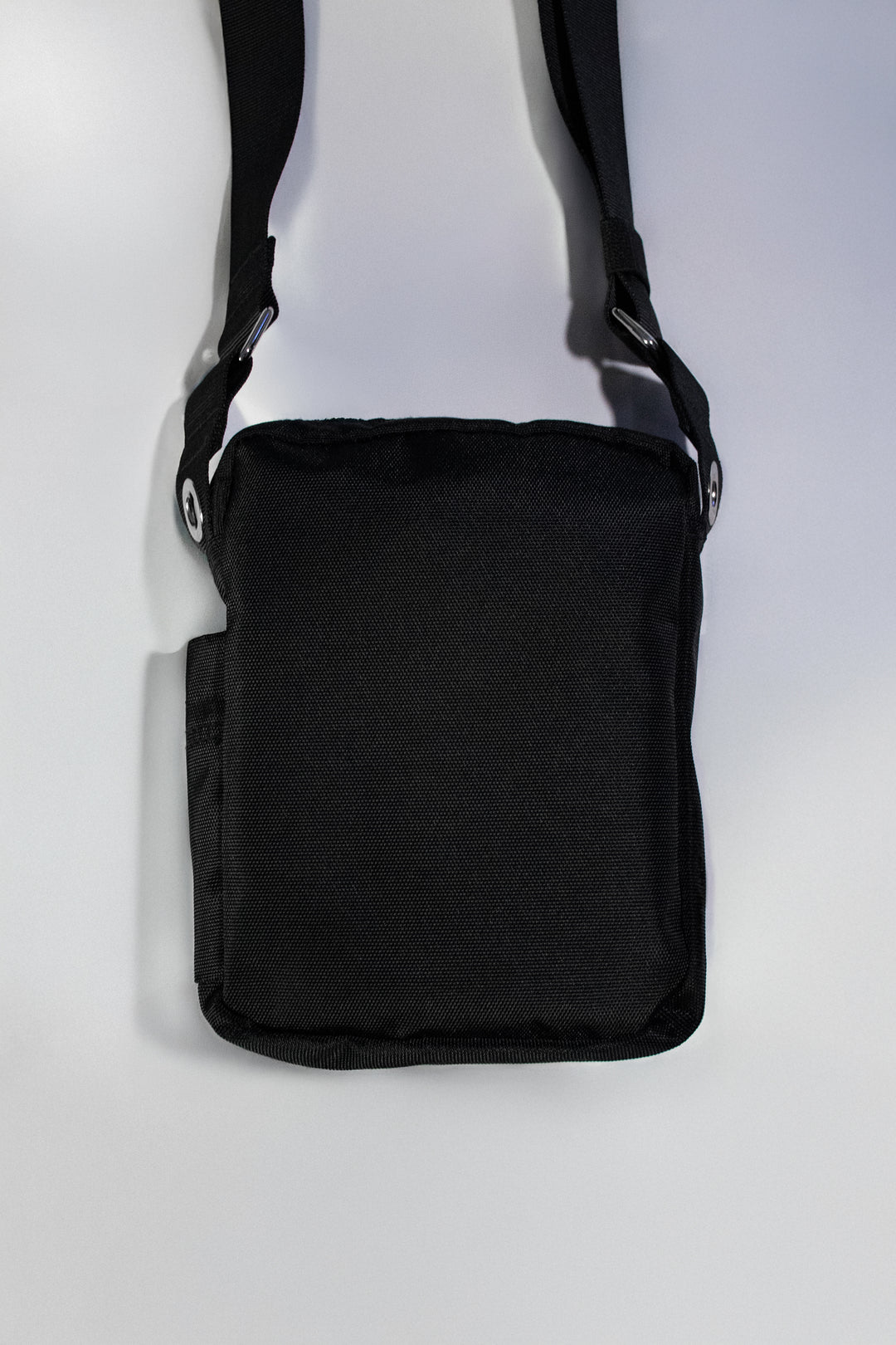 TI CROSS-BODY BAG.